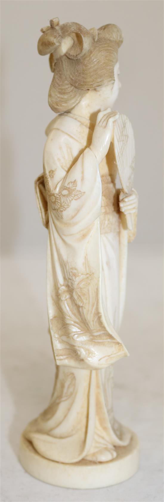 A Japanese ivory figure of a bijin, early 20th century, 19.7cm